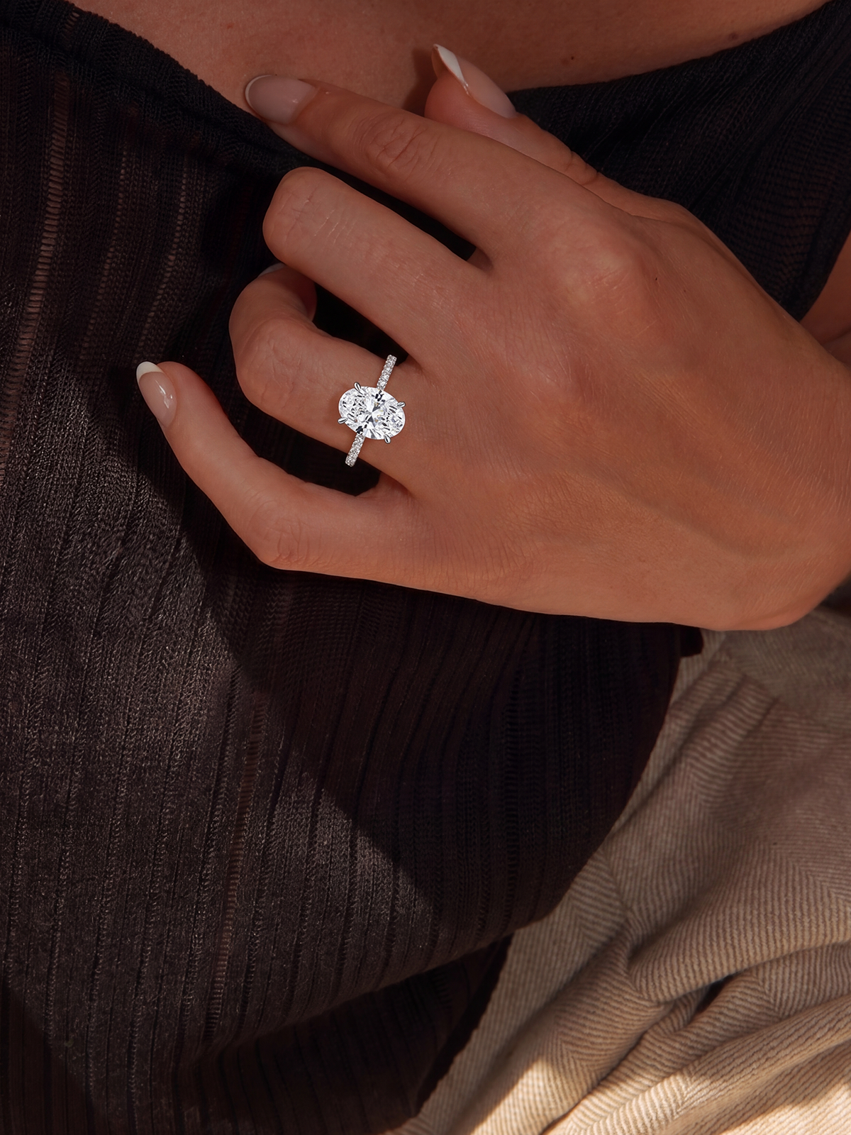 Oval Cut Style Stone-Set Solitaire Ring