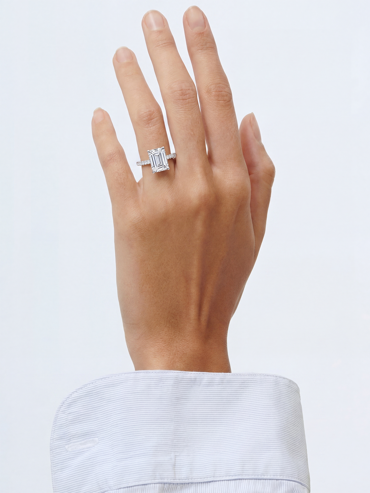 Emerald Cut Style Stone-Set Solitaire Ring