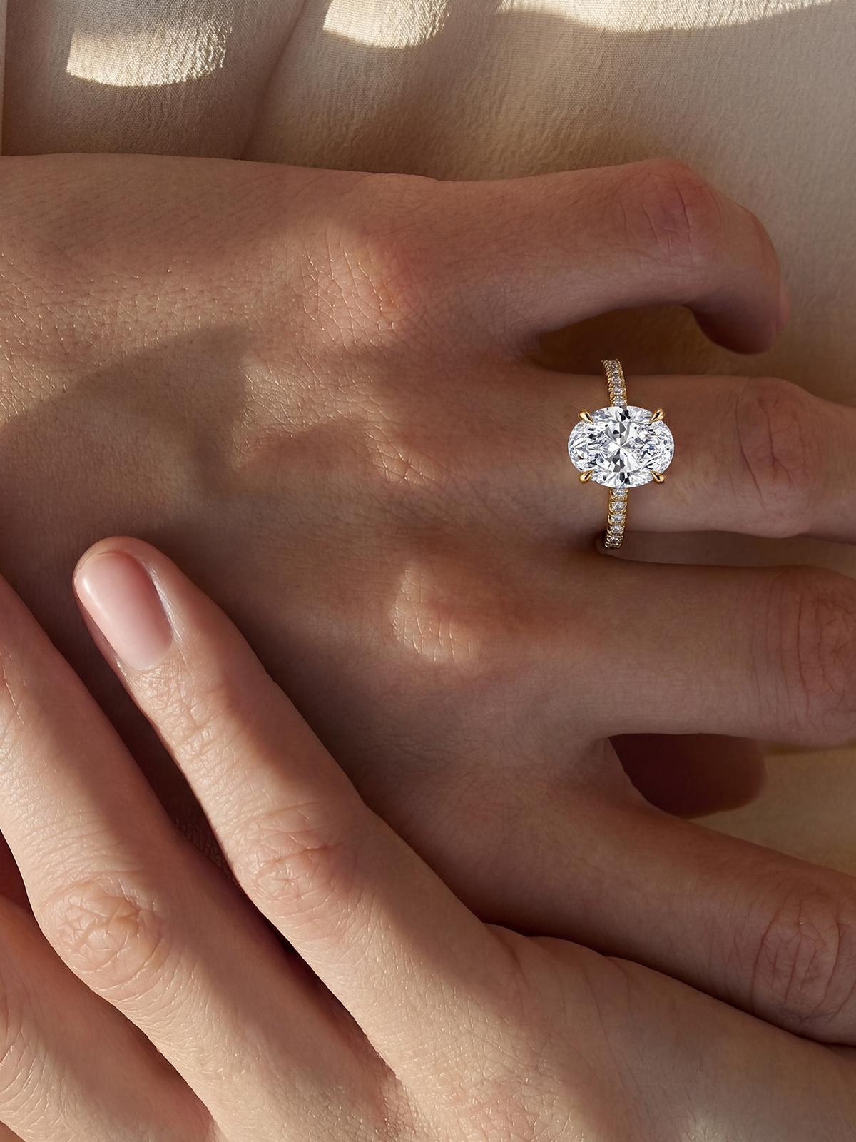 Oval Cut Style Stone-Set Solitaire Ring