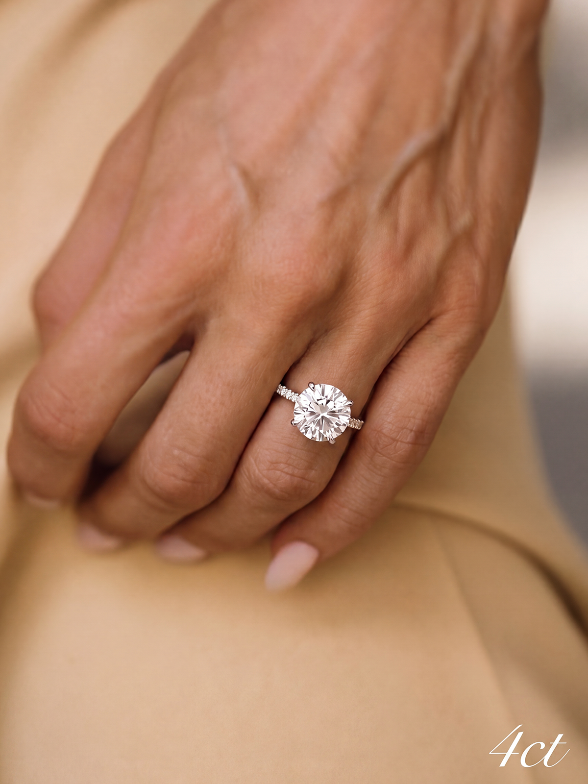 4 Prong Setting Stone-Set Solitaire Ring
